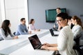 Group of lawyers discussing contract together in office Royalty Free Stock Photo