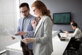 Group of lawyers discussing contract together in office Royalty Free Stock Photo