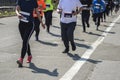 Group legs runners athletes run street of city and Run for Fun