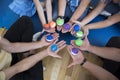 Family session. View from above. Palms with multi-colored small balls in a circle