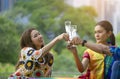 Group of lgbt friends meeting and having a drink together in the park on vacation Royalty Free Stock Photo