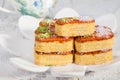 Group of Light Crunchy Puff Layered Pastry Garnished With Pistachios & Coconut Flakes Popular Persian Sweets In Iran Called Royalty Free Stock Photo