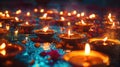 Group of lit candles placed on a table Royalty Free Stock Photo