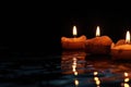 A group of lit candles sitting on top of a table. Suitable for various occasions and events Royalty Free Stock Photo