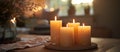 Group of Lit Candles on Wooden Table Royalty Free Stock Photo