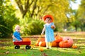 Kids having fun at pumpkin patch Royalty Free Stock Photo