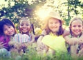 Group of Little Girls Smiling Park Concept