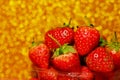 Group of little strawberry soft focus with romantic golden glitter bokeh background.