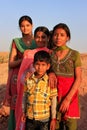 Group of local kids playing near water reservoir, Khichan village, India