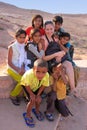 Group of local kids playing near water reservoir, Khichan village, India Royalty Free Stock Photo