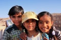 Group of local kids playing near water reservoir, Khichan village, India