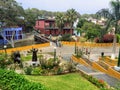 A group of local Peruvians and tourists enjoying the parks and art displays outside around the Plaza Chabuca Granda Royalty Free Stock Photo