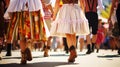Group of locals dressed in traditional Bavarian fluffy skirt, apron, dirndls and lederhosen at Oktoberfest. Banner
