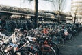 Group of lot of bicycles row parked at parking station