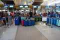 Jakarta, March 2023: Group of luggage lining up at an international airport check-in counter