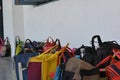 Group of Lunch boxes kept outside the classrooms at school corridor. Royalty Free Stock Photo