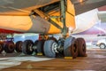 Group of main landing gear of a wide-body aircraft under the wing and fuselage Royalty Free Stock Photo