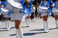 Group of majorettes parade through the streets of the city