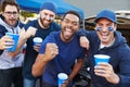 Group Of Male Sports Fans Tailgating In Stadium Car Park Royalty Free Stock Photo