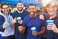 Group Of Male Sports Fans Tailgating In Stadium Car Park Royalty Free Stock Photo