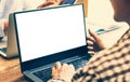 group man sitting the chair research course online website and studying learning on a mockup white screen laptop. e-learning