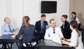 Group of managers with laptops having a productive day Royalty Free Stock Photo