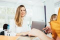 Group of managers sits around table at office and having a meeting on new project Royalty Free Stock Photo