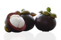 Group mangosteens.Two whole mangosteen fruit and a half