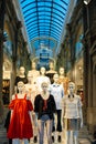 Group of mannequins wearing H and M clothes street view