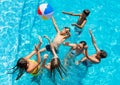 Action game play in swimming pool with ball Royalty Free Stock Photo