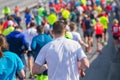 Group of marathon athletes running