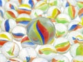 Group of marbles with one big one Royalty Free Stock Photo