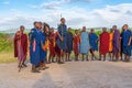 Group of massai warrior participating a traditional dance, one man jumps high