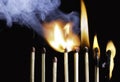Group Of Matches Lit In Row Burning In Chain Reaction with Black Background