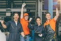 Group of mechanic staff car service team worker people in garage happy smile hand risign Royalty Free Stock Photo