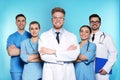 Group of medical doctors on color background