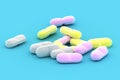 A Group of Medical Pills on a blue background Royalty Free Stock Photo