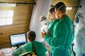 A group of medical staff in a field hospital