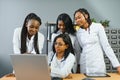 Group Of Medical Staff Meeting Around Table In Hospital. Royalty Free Stock Photo