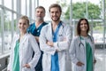 Group of medical staff smiling at the hospital.