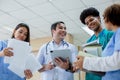 Group of medical student with teacher holding book standing front classroom in hospital university. education and learning medical Royalty Free Stock Photo