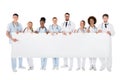 Group Of Medical Team Holding Blank Billboard Royalty Free Stock Photo