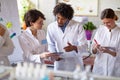 Group of medical workers working in lab Royalty Free Stock Photo