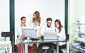 Group of medicine students at health care clinic working on computer research Royalty Free Stock Photo