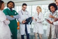 Group of medics discuss x-ray scan Royalty Free Stock Photo