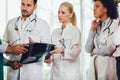 Group of medics discuss x-ray scan Royalty Free Stock Photo