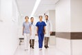 Group of medics or doctors at hospital corridor Royalty Free Stock Photo