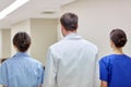 Group of medics or doctors walking along hospital Royalty Free Stock Photo