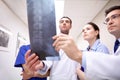 Group of medics with spine x-ray scan at hospital Royalty Free Stock Photo