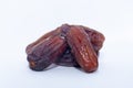A group of medjool dates from Saudi Arabia on an  white background for Ramadan Royalty Free Stock Photo